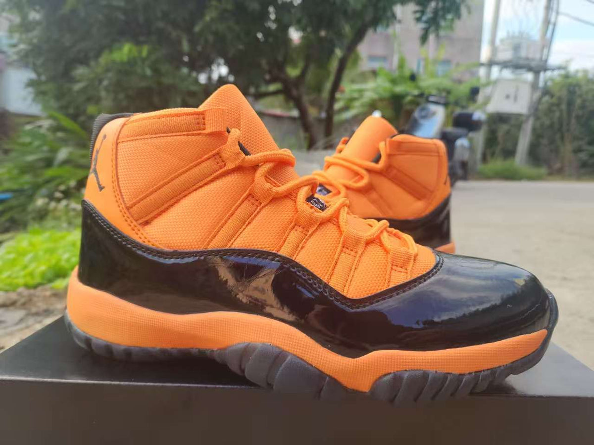 Air Jordan 11 Retro ‘Black Orange’