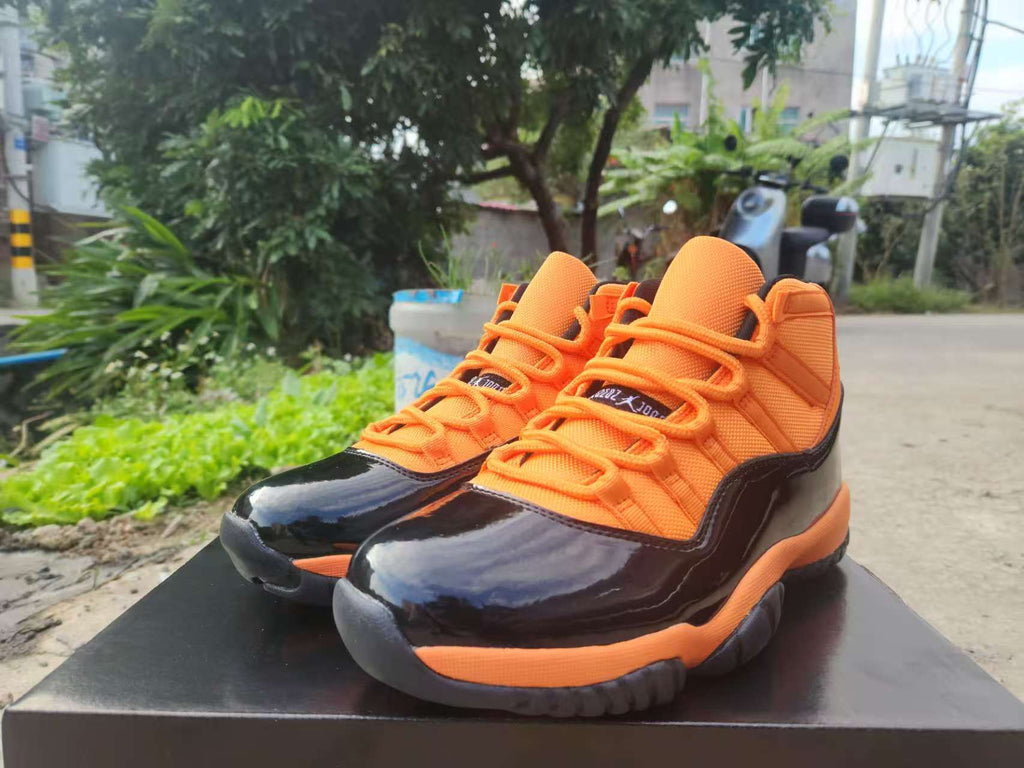 Air Jordan 11 Retro ‘Black Orange’